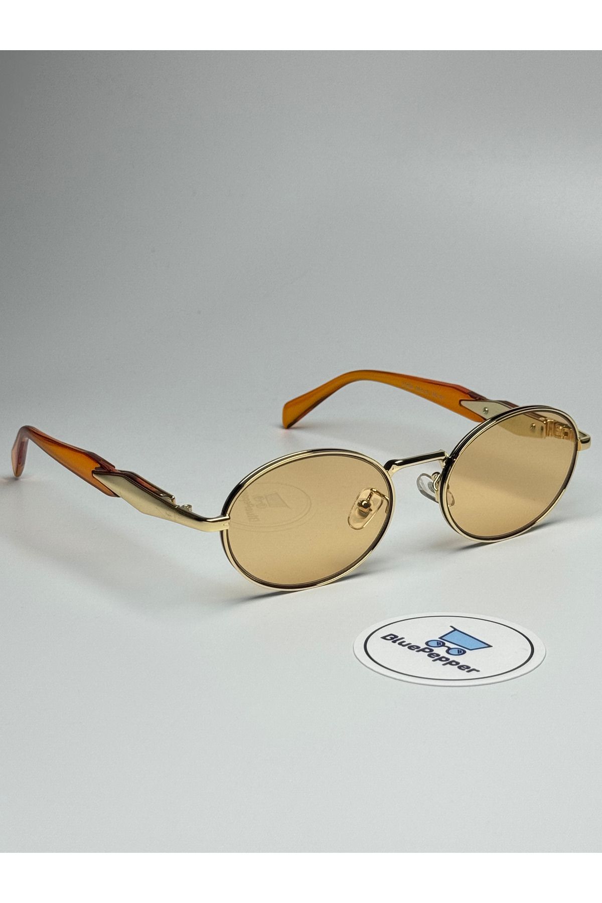 PRADIX V3 TURUNCU GÜNEŞ GÖZLÜĞÜ Oval Gold Çerçeve Turuncu Cam Renkli 50-18-150 ekartman